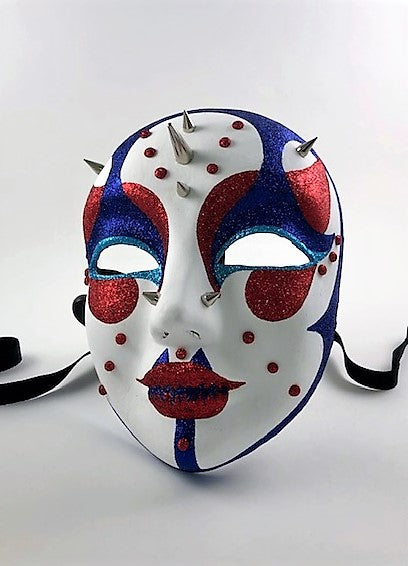 Blue and Red Masquerade masks with wall store displays.